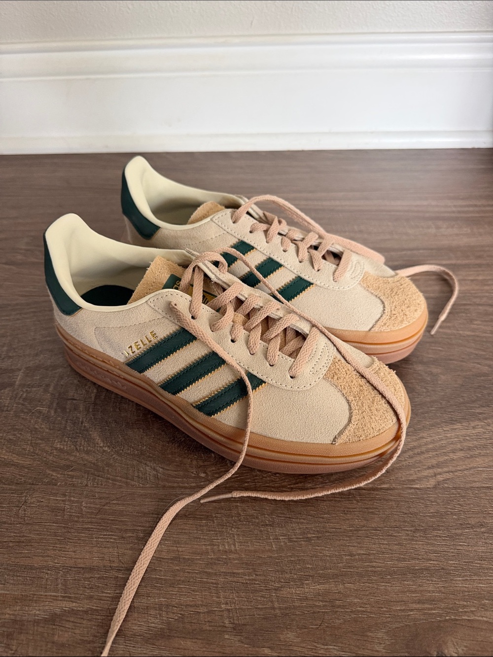 Adidas Women’s Sneaker in Beige with Dark Green Stripes